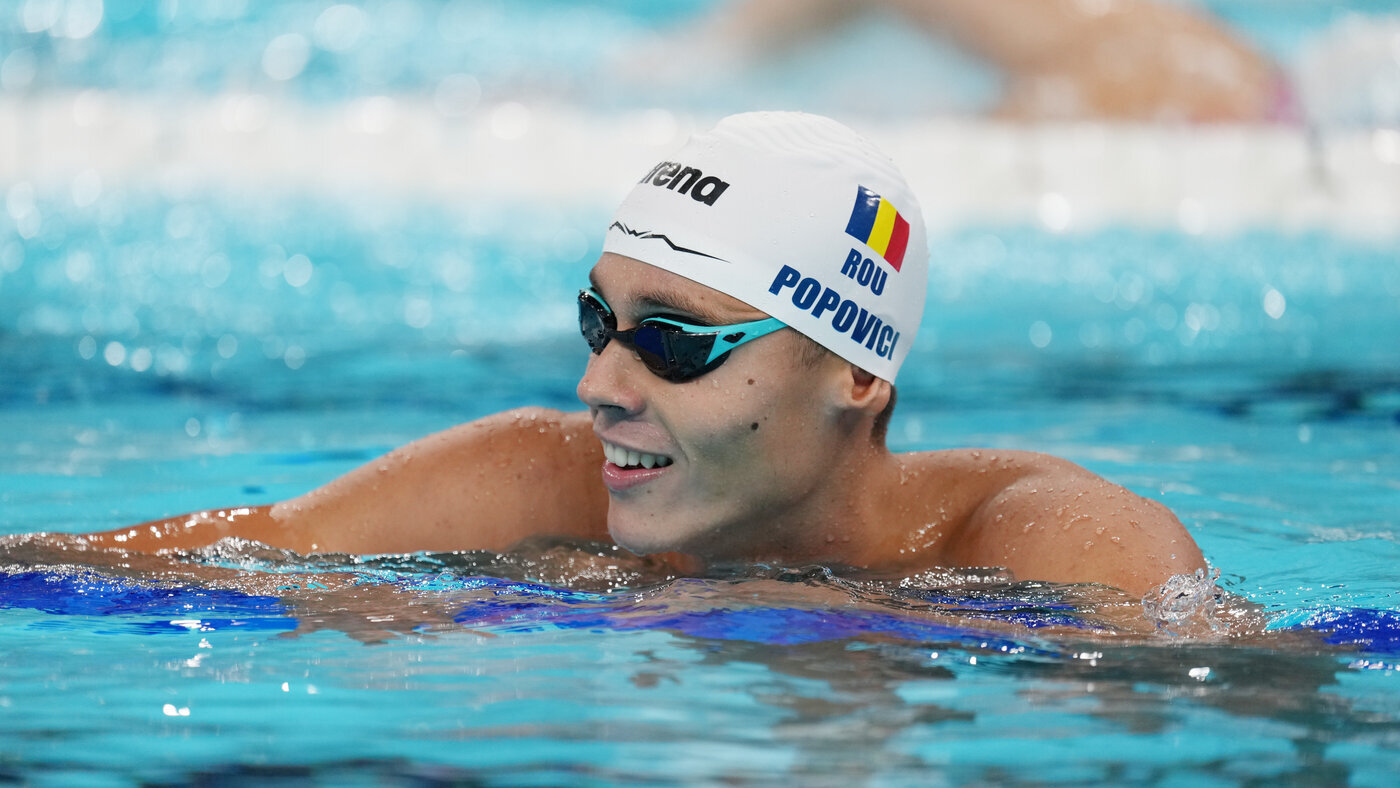 Румын Попович выиграл  на дистанции 200 метров вольным стилем на Олимпиаде