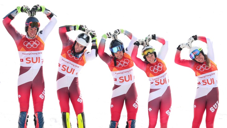 Швейцарские горнолыжники завоевали золото ОИ в командных соревнованиях